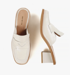 Top and side view of white loafer mules