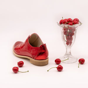 Patent red oxfords with metallic heel