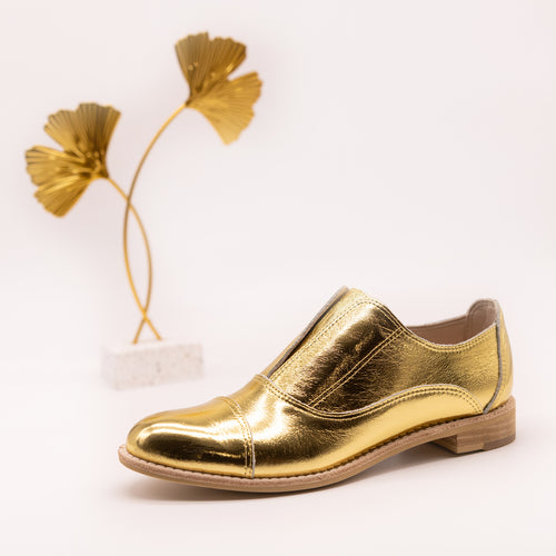Shiny gold leather oxfords