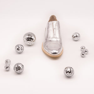 Shiny silver leather oxfords with mini disco balls