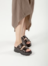Load image into Gallery viewer, Black strappy flatform sandal worn on model