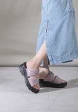 Load image into Gallery viewer, Purple slide sandals worn with denim midi skirt