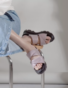 Purple Slide Sandals worn on feet
