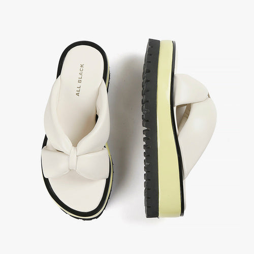 Ivory leather slide sandal with yellow and black sole