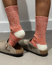 Load image into Gallery viewer, Woman wearing orange and white socks and clogs