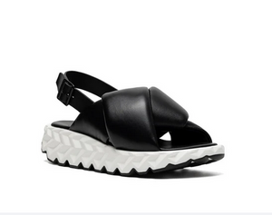 Black sandal with white rubber sole