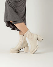 Load image into Gallery viewer, Off-white ankle boots worn with grey skirt