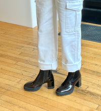 Load image into Gallery viewer, Brownish burgundy ankle boots worn with white cargo pants