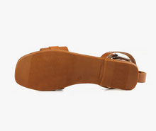 Load image into Gallery viewer, Sole of flat tan sandal