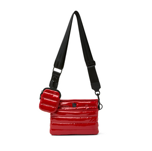 Red quilted crossbody bag with chain detail