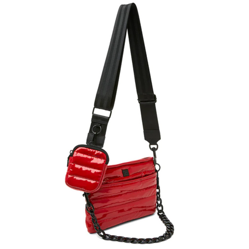 Red quilted crossbody bag with chain detail