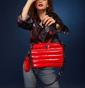 Red quilted crossbody bag with chain detail