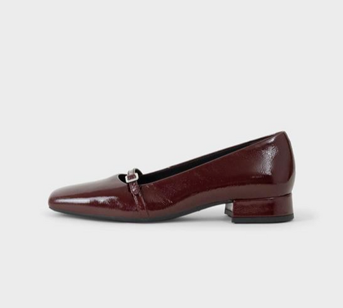 Side view burgundy patent Mary Jane flats