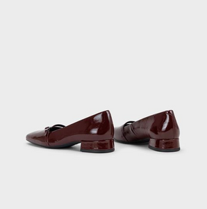 Back view of dark red patent shoes