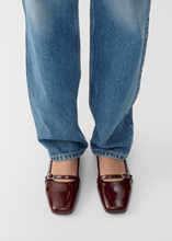 Load image into Gallery viewer, Burgundy patent low heel  Mary Janes worn with jeans