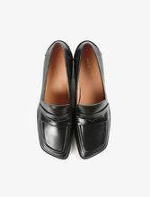 Load image into Gallery viewer, Sleek black leather loafers with angled toe shape