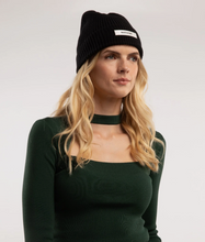 Load image into Gallery viewer, woman wearing black beanie