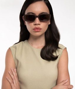 woman wearing rectangle sunglasses