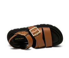 Load image into Gallery viewer, brown strappy sandal with black sole top view.