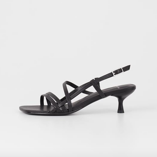side view of black low heeled strappy sandals