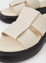 Load image into Gallery viewer, Close up off white leather slide sandal