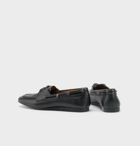 back view of black leather boat shoe flats