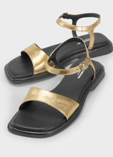 Load image into Gallery viewer, Close up details of gold leather flat sandals