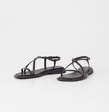 Load image into Gallery viewer, pair of black strappy flat sandals