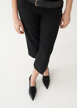 Load image into Gallery viewer, Pointy black shoes worn with black trousers