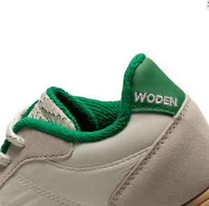 close up of green leather with white Woden logo