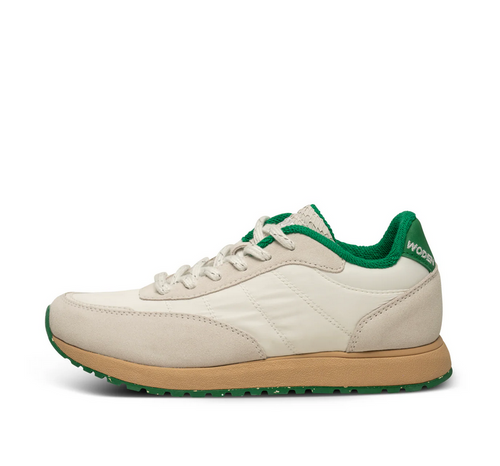 white and green sneaker by Woden side view