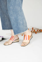 Load image into Gallery viewer, Gold wedge sandals worn with jeans