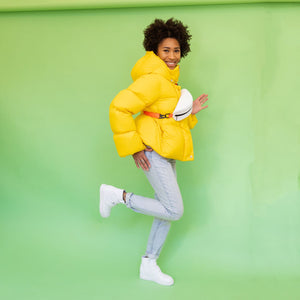 White high top wedge sneaker worn by model