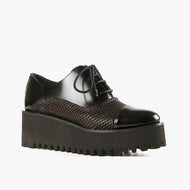 Black perforated leather wedge shoe