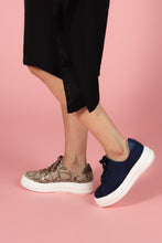 Load image into Gallery viewer, Model wearing Tan snakeskin chunky sneaker and Navy nubuck and embossed leather chunky sneaker