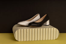 Load image into Gallery viewer, Black and white leather pump with chunky heels.