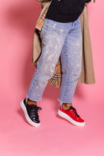 Load image into Gallery viewer, Model wearing Black embossed snakeskin leather chunky sneaker and Red leather chunky sneaker