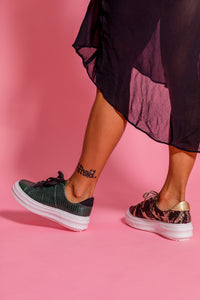 Model wearing Black and Gold patterned chunky sneaker and Dark Green embossed snakeskin leather chunky sneaker