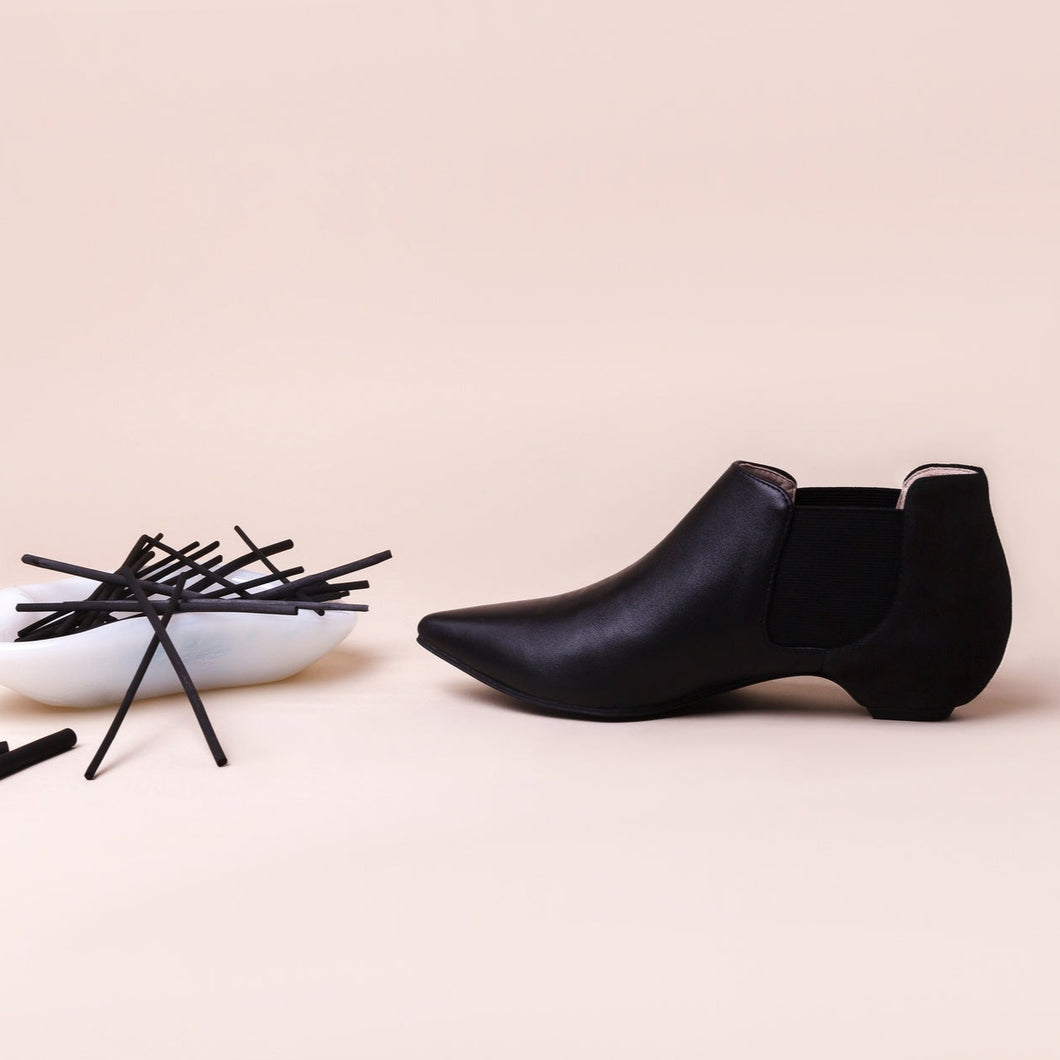 Black leather and suede boots