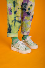 Load image into Gallery viewer, Model wearing Green and Gold Tie Dye chunky sneakers