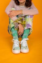 Load image into Gallery viewer, Model wearing Green and Gold Tie Dye chunky sneakers