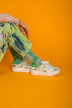 Load image into Gallery viewer, Model wearing Green and Gold Tie Dye chunky sneakers