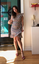 Load image into Gallery viewer, Red strappy sandal worn with flowery dress
