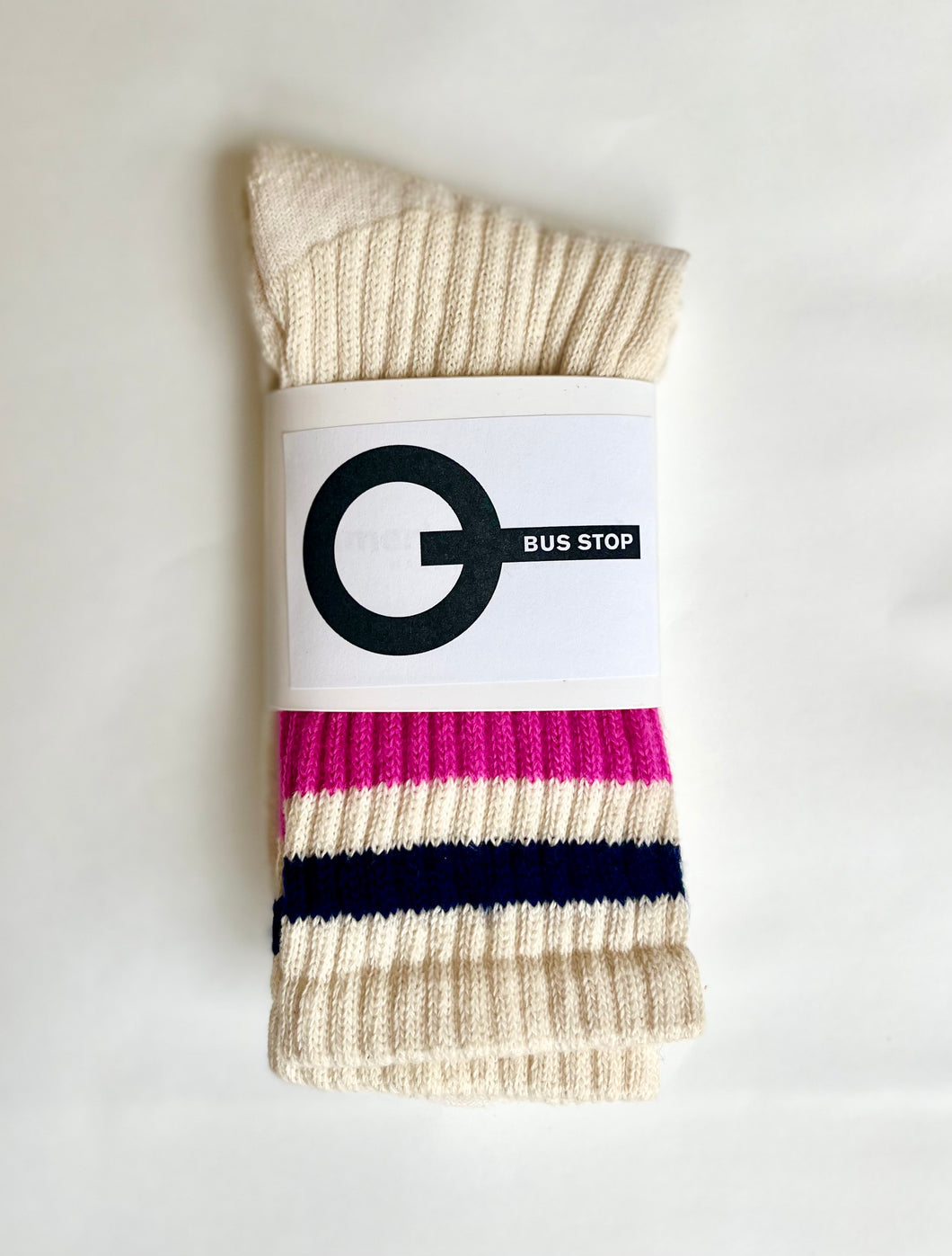 White crew sock with pink and navy stripes