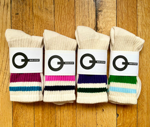 4 White crew socks with multicolored stripes