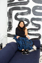 Load image into Gallery viewer, Model wearing Black leather &amp; black patent lace-up urban sneaker.