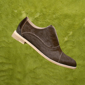 Rich chocolate brown pony hair slip-on flat oxford shoes.