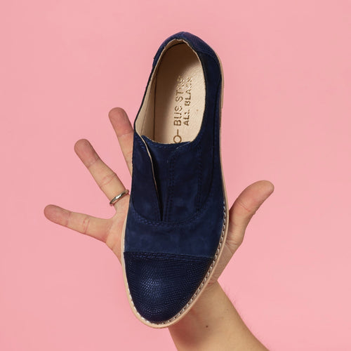 Model holding Navy oxford