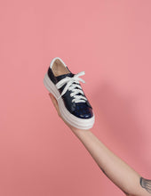 Load image into Gallery viewer, Model holding Navy leather chunky sneaker