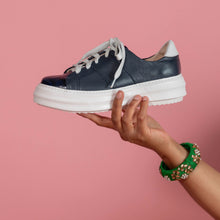 Load image into Gallery viewer, Model holding Navy leather chunky sneaker